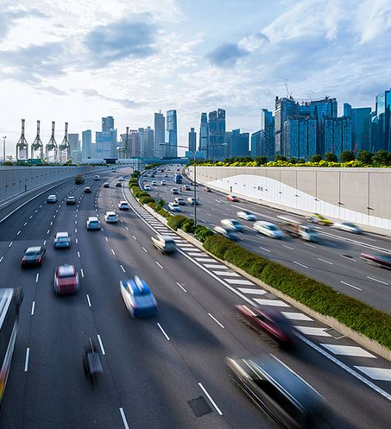 busy-road-and-city-background-during-rush-hour-with-motion-blurred-vehicle-car-in-singapore-city busy-road-and-city-background-during-rush-hour-with-motion-blurred-vehicle-car-in-singapore-city